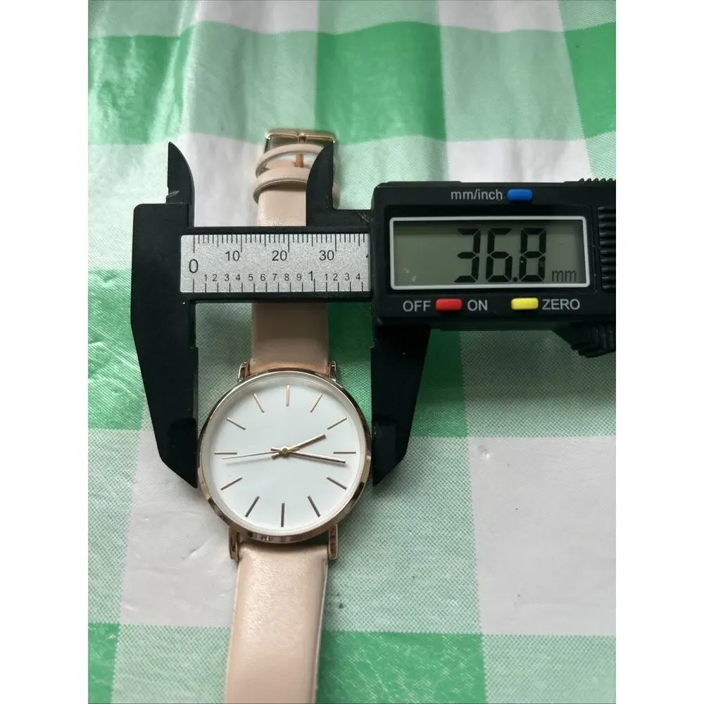 Rose Gold Tone White Dial Women’s Quartz Watch